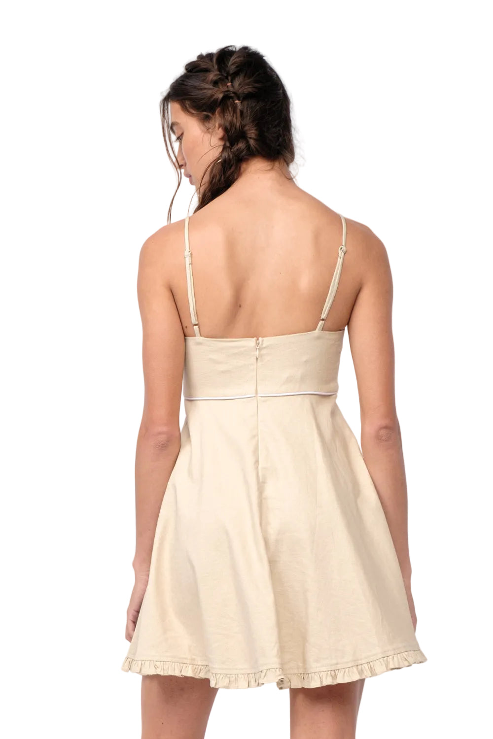 Cream spaghetti-strap dress with low open back and ruffled hem