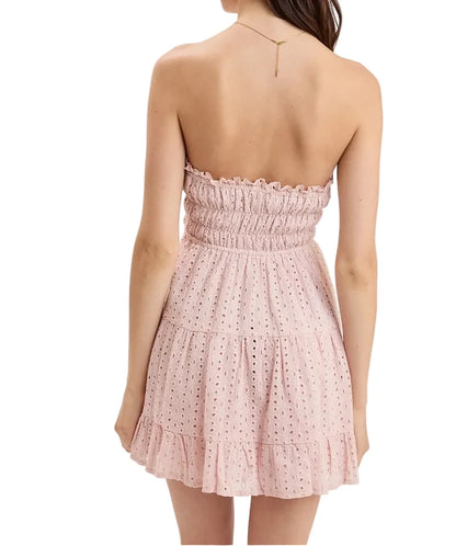 Back of Quinn dress, light pink strapless smocked bodice with tiered mini skirt