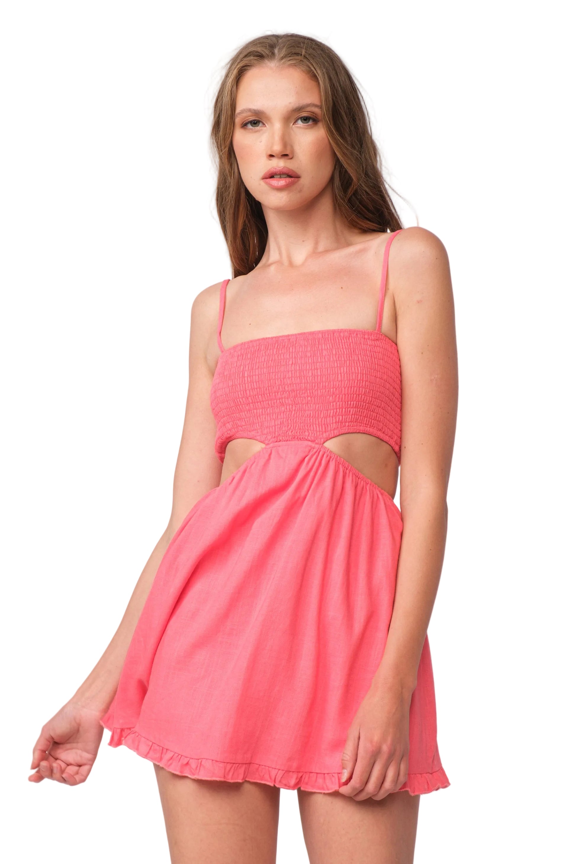 Vera dress in pink with spaghetti straps, smocked bust, and gathered skirt