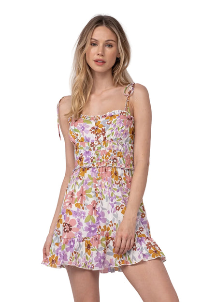 Floral Nyla dress with spaghetti straps, ruched waist, tiered mini skirt