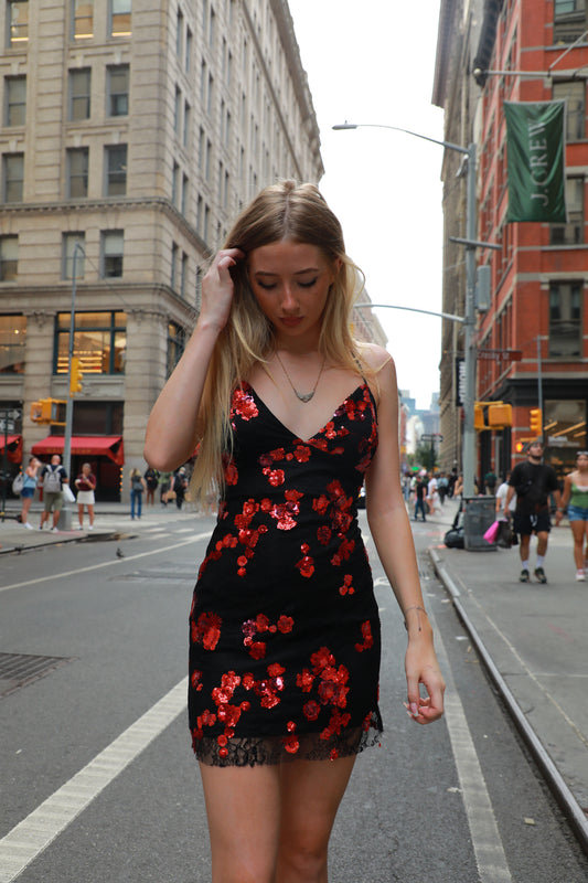 Black floral sequin mini dress with V-neck and spaghetti straps