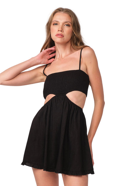 Vera dress in black with spaghetti straps, smocked bodice and gathered short skirt