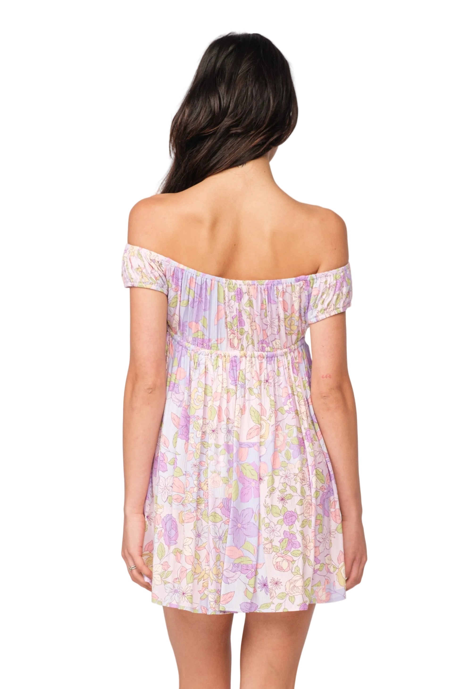 Back view of floral off-shoulder mini dress with smocked waist, pastel lilac.