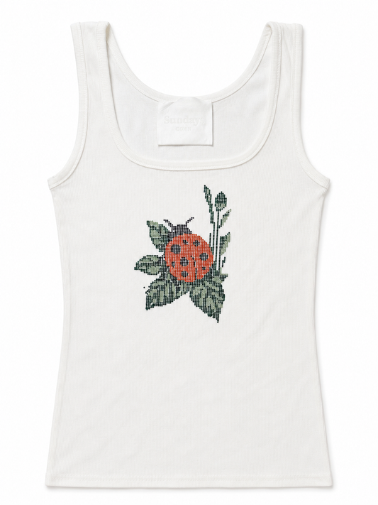 White ribbed tank top with rhinestone ladybug applique
