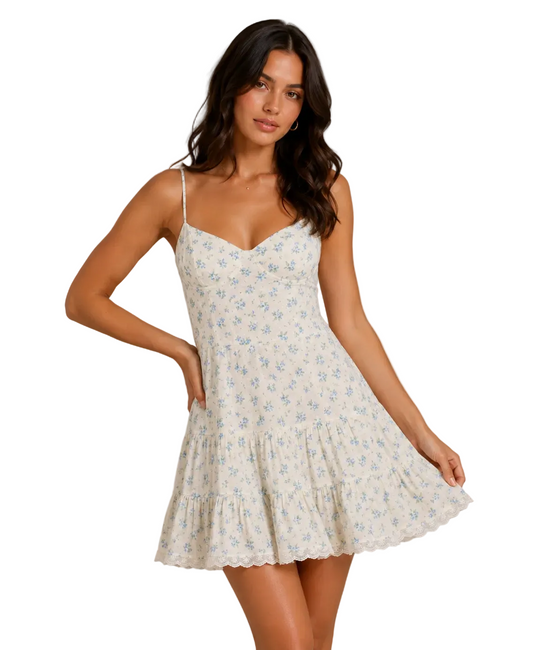 Floral sundress with spaghetti straps, V-neck bodice, tiered skirt and scalloped hem