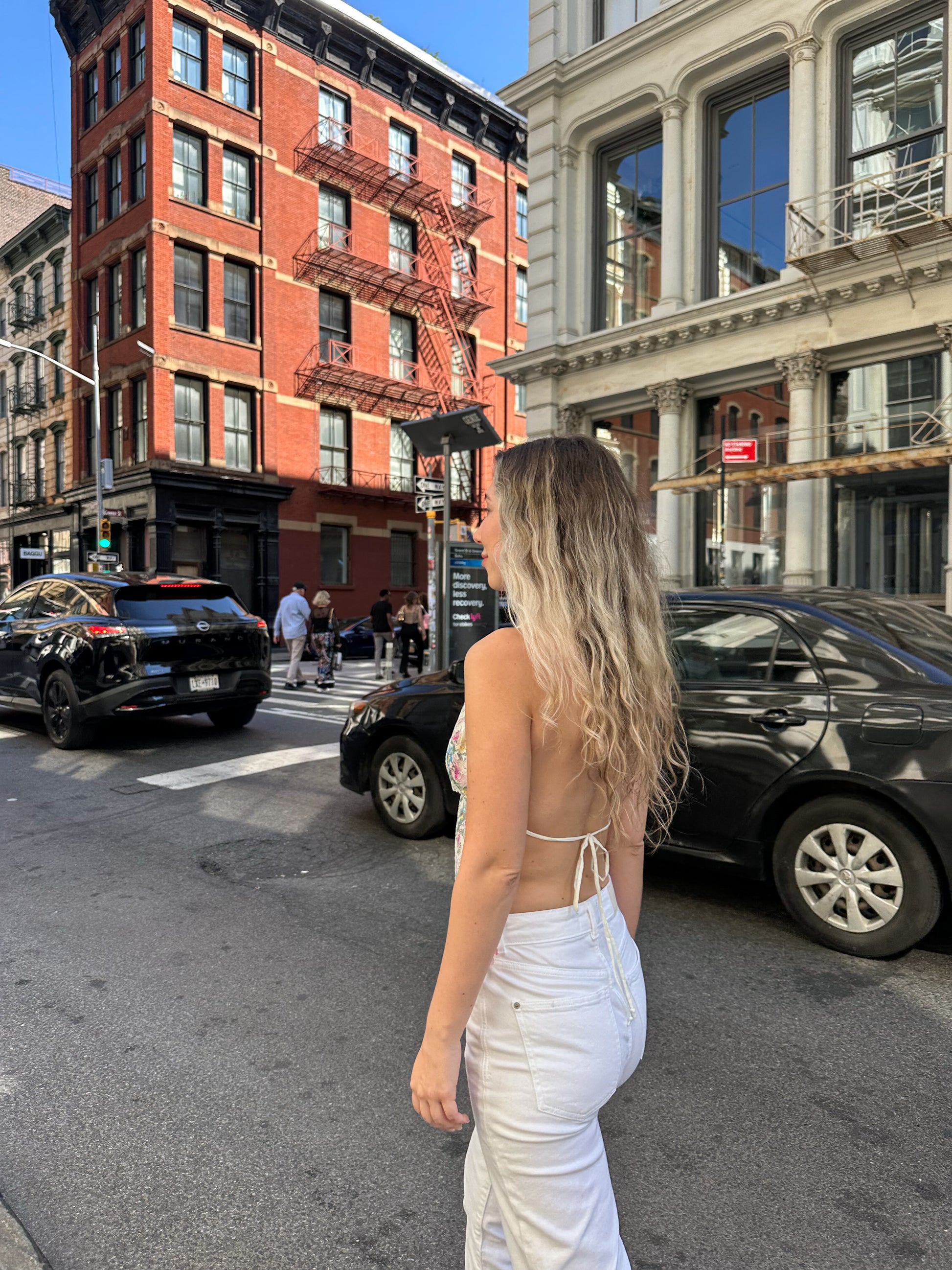 Floral halter top with open back tie straps and sleeveless V front