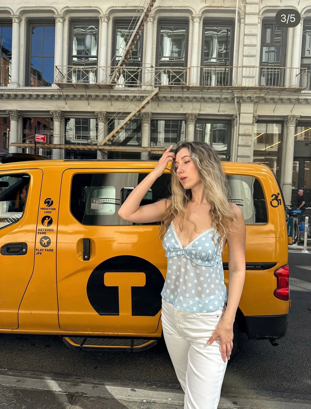 Light blue polka-dot camisole top with V-neck and narrow straps