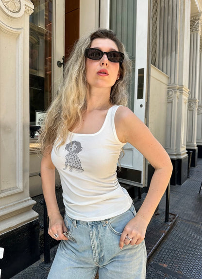 White sleeveless tank with rhinestone dalmatian graphic on chest