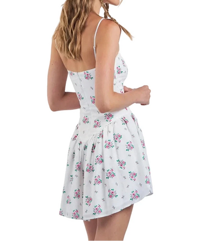 White floral sundress back view with spaghetti straps and gathered waist